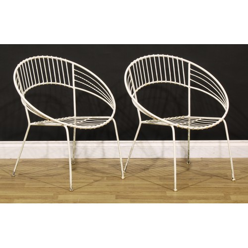 3361 - A wirework three-piece garden suite, comprising a pair of satellite shaped chairs and occasional tab... 