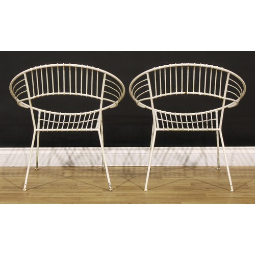 3361 - A wirework three-piece garden suite, comprising a pair of satellite shaped chairs and occasional tab... 