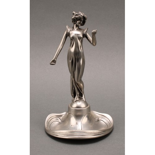 3371 - A pewter pocket watch stand, as an Art Nouveau maiden in flowing dress, dished base, number 9706, 20... 