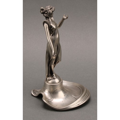 3371 - A pewter pocket watch stand, as an Art Nouveau maiden in flowing dress, dished base, number 9706, 20... 