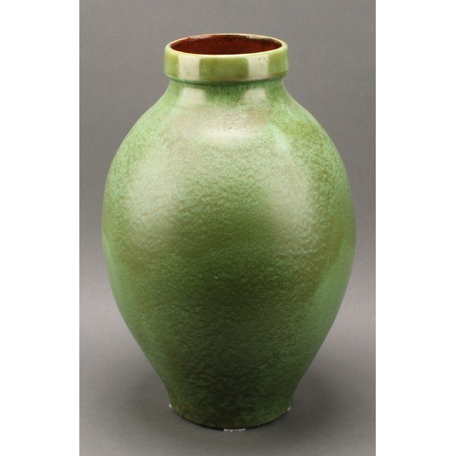 3029 - A large C H Brannam, Barum, Barnstaple terracotta ovoid vase, drip glazed in mottled moss green, 39c... 