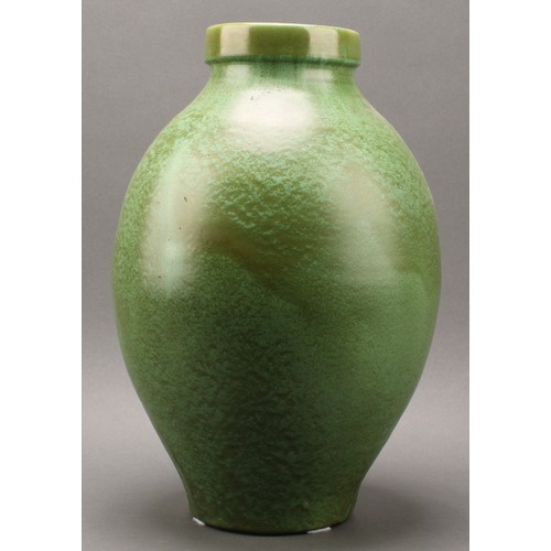 3029 - A large C H Brannam, Barum, Barnstaple terracotta ovoid vase, drip glazed in mottled moss green, 39c... 