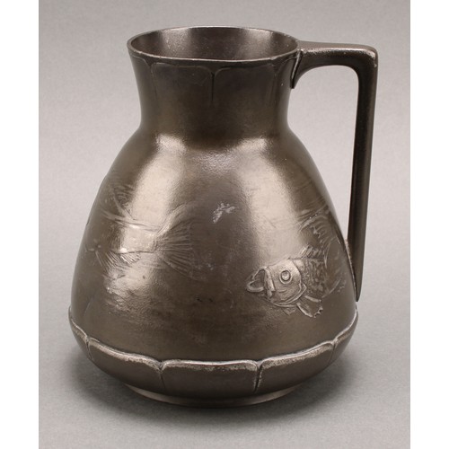 3313 - A German Jugenstil Kayserzinn pewter jug, moulded with a shoal of fish, lily pad borders, angular ha... 