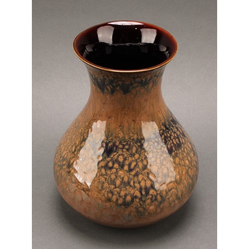 3027 - A Lancastrian Pottery baluster vase, drip glazed in mottled lustrous shades of brown and ochre, 21cm... 