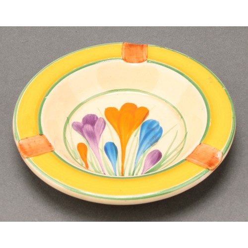 3000 - A Clarice Cliff Bizarre Crocus pattern circular plate, 23cm diameter, Newport Pottery, England, prin... 