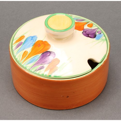 3010 - A pair of Clarice Cliff Crocus pattern compressed circular preserve jars and covers, 7cm high, Newpo... 