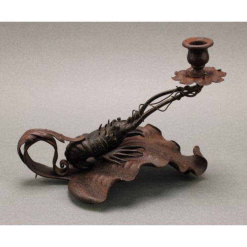 3385 - An Aesthetic Movement period wrought iron chamber stick, incorporating a Japanese Meiji period dark ... 