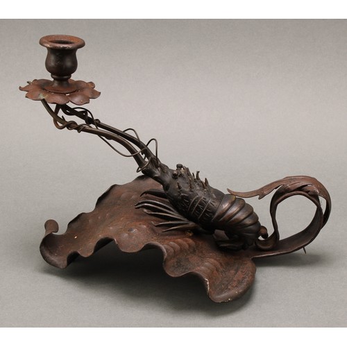 3385 - An Aesthetic Movement period wrought iron chamber stick, incorporating a Japanese Meiji period dark ... 