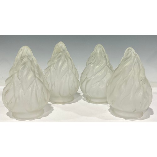 3228 - A set of four Art Deco frosted clear glass flame shaped light shades, 18cm