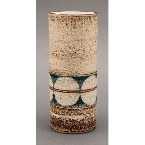 3176 - A Troika cylindrical vase, by Linda Hazel, monogrammed, applied with a band of divided roundels,14cm... 