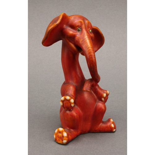 3051 - An Art Deco Grafton China comical model of an elephant, seated with elongated neck and curling trunk... 