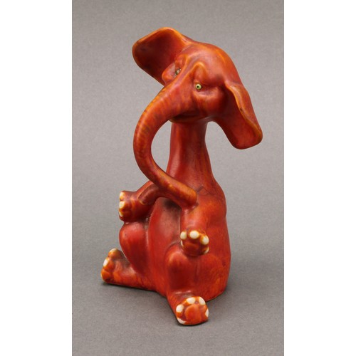 3051 - An Art Deco Grafton China comical model of an elephant, seated with elongated neck and curling trunk... 