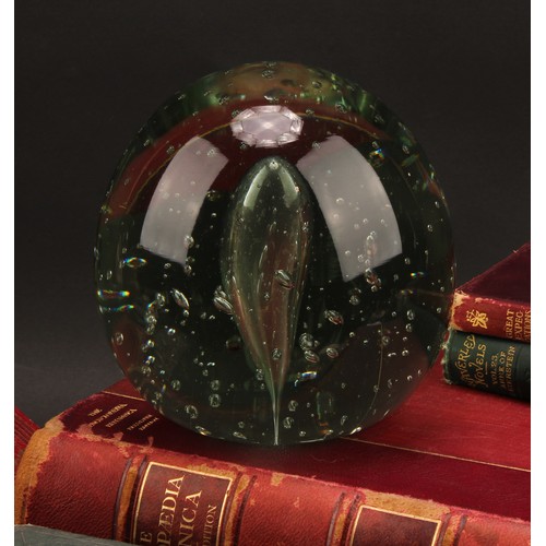 3233 - A Victorian large green glass dump, with bubble inclusions, 15.5cm, c.1870