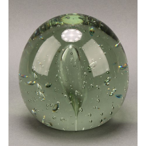 3233 - A Victorian large green glass dump, with bubble inclusions, 15.5cm, c.1870