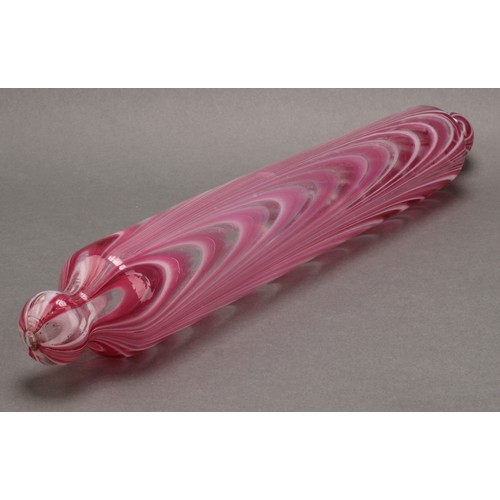 3225 - A Nailsea pink and white opaque glass rolling pin, 42cm