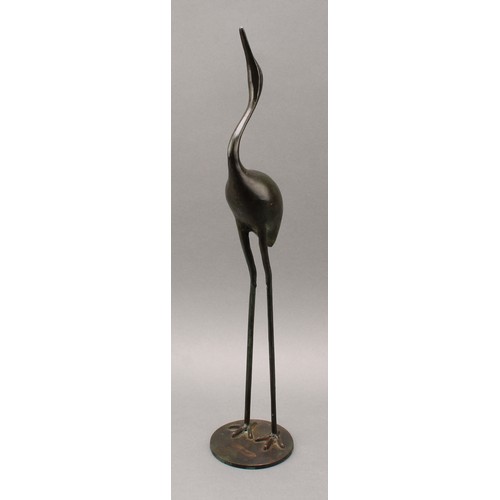 3399 - Modern School, a pair of verdigris patinated bronzes, of cranes, circular bases, 53.5cm and 40cm hig... 