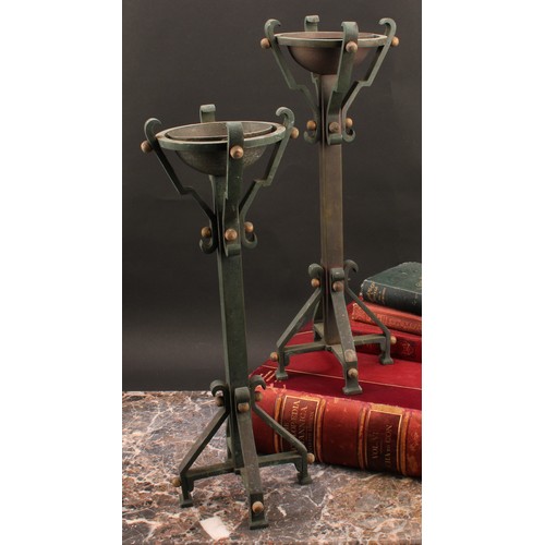 3370 - A pair of Secessionist period verdigris patinated and parcel-gilt table pricket candlesticks, of Got... 