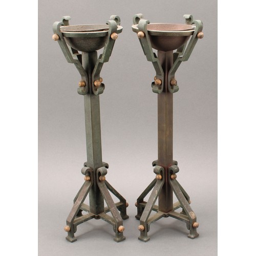 3370 - A pair of Secessionist period verdigris patinated and parcel-gilt table pricket candlesticks, of Got... 