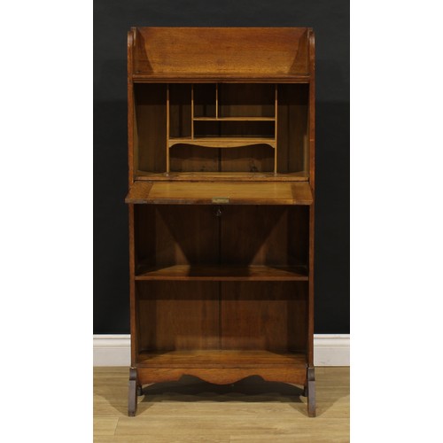 3412 - An Arts and Crafts oak bureau bookcase, shaped three-quarter gallery, fall front with beaten copper ... 