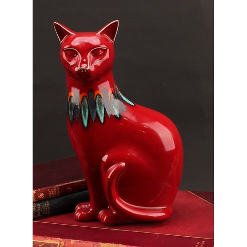 3076 - A Poole pottery model, of a cat, red Delphis glaze, 29.5cm high