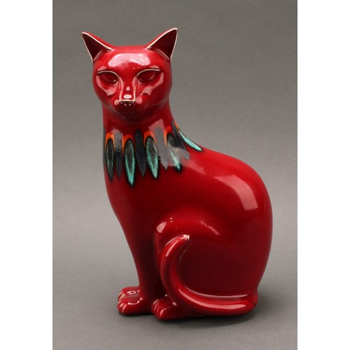 3076 - A Poole pottery model, of a cat, red Delphis glaze, 29.5cm high