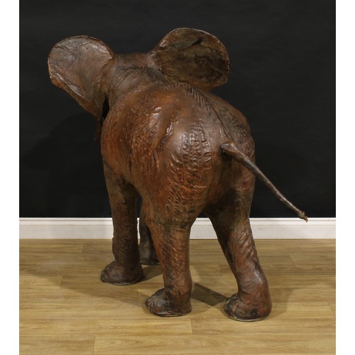 3342 - A large mid-20th century leather wrapped model of an elephant, in the manner of Liberty, possibly a ... 