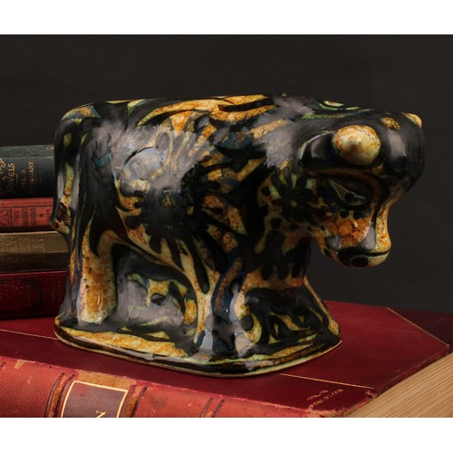 3213 - Studio Pottery - Maggi Fisher for Celtic Pottery, a stylised model of a bull, hand painted, 13.5cm h... 