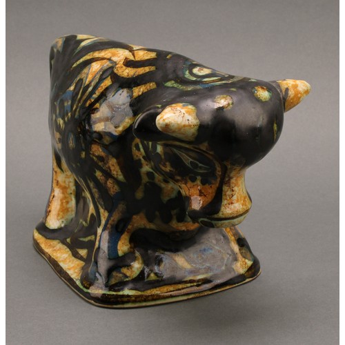 3213 - Studio Pottery - Maggi Fisher for Celtic Pottery, a stylised model of a bull, hand painted, 13.5cm h... 