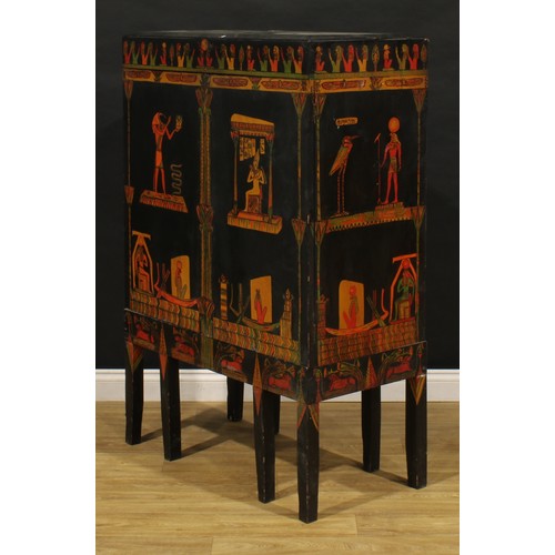 3415 - An Egyptian Revival design side cabinet, ebonised and polychrome decorated in the manner of The Grea... 