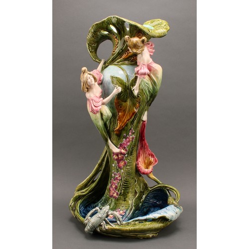 3030 - A large Continental art pottery vase, modelled with young girls beside a fountain, the pool edge wit... 