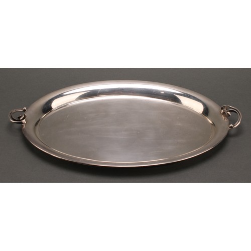 3311 - A Danish E.P.N.S oval cocktail tray, in the Georg Jensen manner, lotus scroll handles, 35cm wide, mi... 