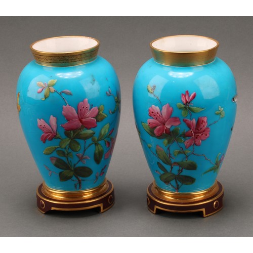 3035 - A pair of Mintons Aesthetic Movement chinoiserie ovoid vases, enamelled with blossom and insects on ... 