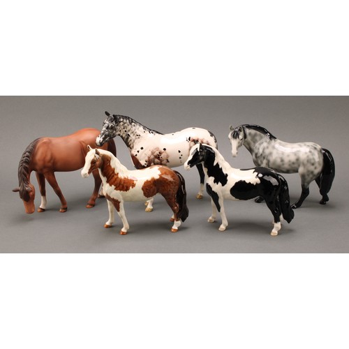 3078 - A Royal Doulton model of an Appaloosa horse, 20cm, printed mark; a Beswick skewbald Pinto pony, 17cm... 