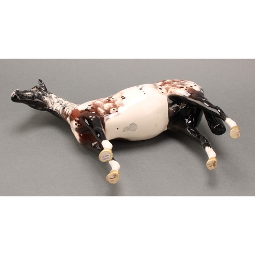 3078 - A Royal Doulton model of an Appaloosa horse, 20cm, printed mark; a Beswick skewbald Pinto pony, 17cm... 