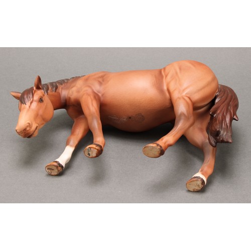 3078 - A Royal Doulton model of an Appaloosa horse, 20cm, printed mark; a Beswick skewbald Pinto pony, 17cm... 