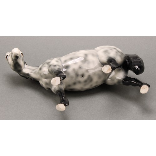 3078 - A Royal Doulton model of an Appaloosa horse, 20cm, printed mark; a Beswick skewbald Pinto pony, 17cm... 