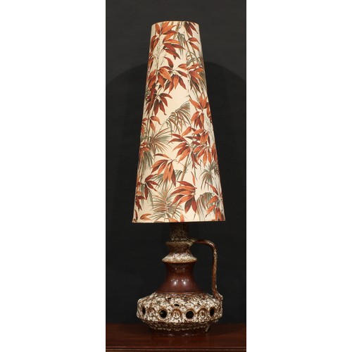 3046 - A Stein Keramik fat lava type table lamp and shade, pierced compressed circular base, waisted neck, ... 