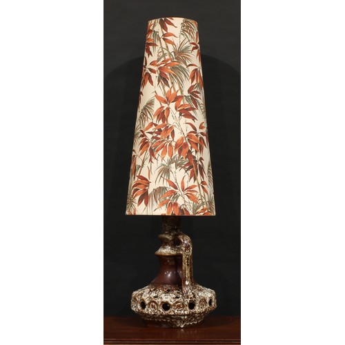 3046 - A Stein Keramik fat lava type table lamp and shade, pierced compressed circular base, waisted neck, ... 