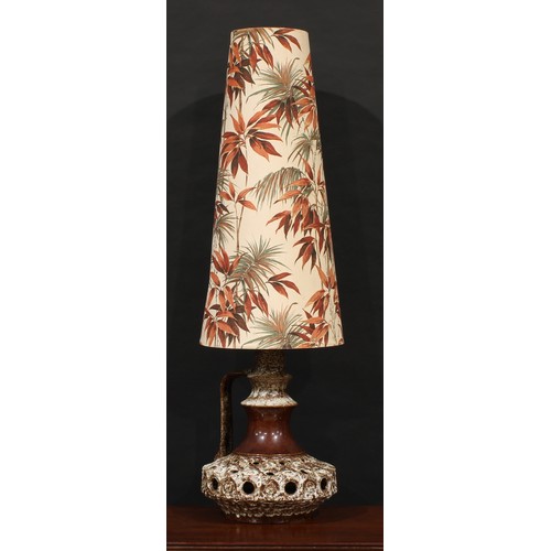 3046 - A Stein Keramik fat lava type table lamp and shade, pierced compressed circular base, waisted neck, ... 