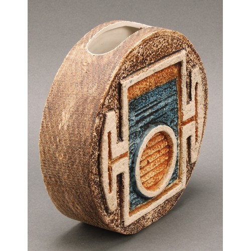 3190 - A Troika wheel vase, by Alison Brigden, incised and impressed with geometric shapes in shades of blu... 