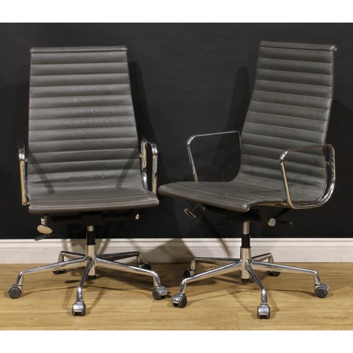 3301 - 20th Century Design - a pair of swivel office chairs, after a design by Charles & Ray Eames for Herm... 