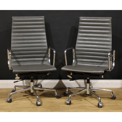 3302 - 20th Century Design - a pair of swivel office chairs, after a design by Charles & Ray Eames for Herm... 