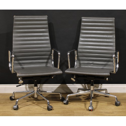 3304 - 20th Century Design - a pair of swivel office chairs, after a design by Charles & Ray Eames for Herm... 