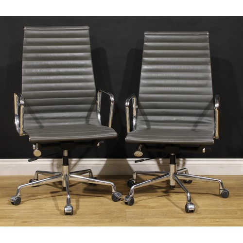 3305 - 20th Century Design - a pair of swivel office chairs, after a design by Charles & Ray Eames for Herm... 