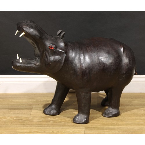 3417 - Interior Design - a leather model of a hippopotamus, in the manner of Liberty, 59cm high, 70cm long