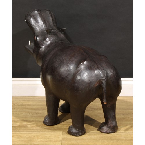 3417 - Interior Design - a leather model of a hippopotamus, in the manner of Liberty, 59cm high, 70cm long