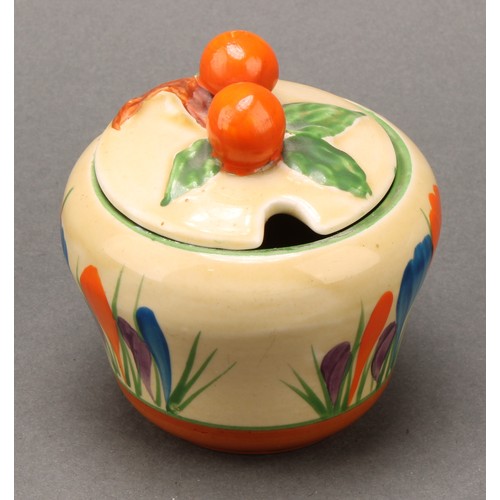 3005 - A Clarice Cliff Crocus pattern waisted preserve pot and cover, painted in colours with crocuses, ban... 