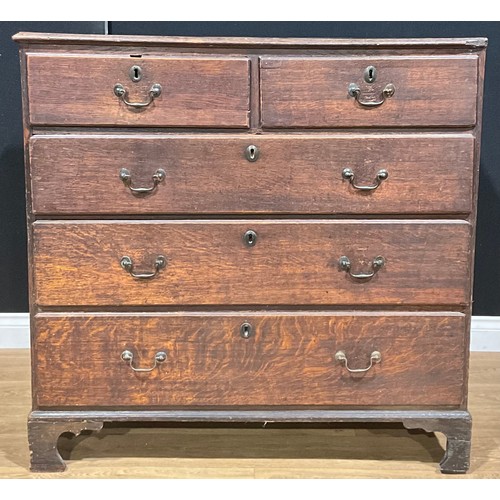 102 - A George III oak chest, of two short and three long drawers, 106.5cm high, 108cm wide, 57cm deep