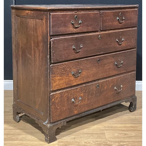 102 - A George III oak chest, of two short and three long drawers, 106.5cm high, 108cm wide, 57cm deep