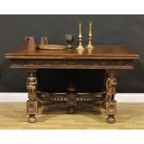 120 - A French Arts & Crafts period oak draw-leaf dining table, in the Henry II taste, parquet de Versaill... 